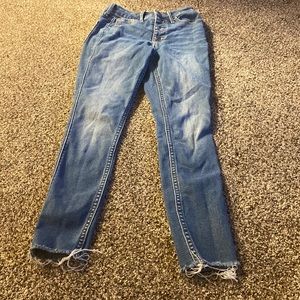 Old navy blue tight jeans.